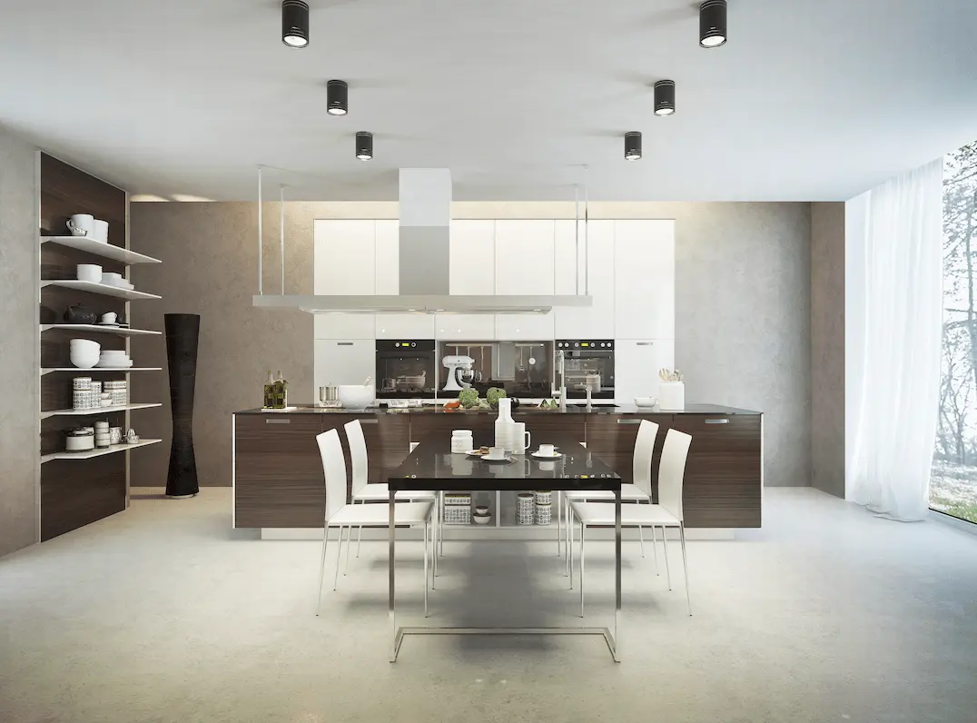 Large kitchen with wall covered with microcement where there were tiles before.